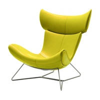 Chaise Imola Boconcept avec repose-pieds, pieds en métal massif chromé, robuste