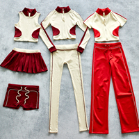 Ensembles de sport deux pièces pour femmes, personnalisés en usine, vente en gros, avec crop top color block et pantalon de jogging, adaptés aux grandes tailles
