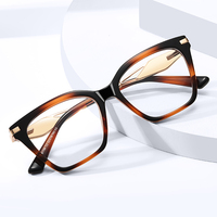 MS 81798 Nouvelles lunettes anti-lumière bleue pour femme, monture œil de chat translucide, branches métalliques ajourées incrustées de strass en losange, polyvalentes