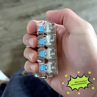Testeur de commutateurs de clavier anti-stress créatif avec effets lumineux RGB en plastique à fort rebond, gadget de décompression Zhejiang