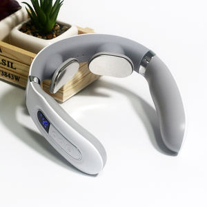 Masajeador de cuello en forma de U inalámbrico al por mayor barato para aliviar el <span class=keywords><strong>dolor</strong></span>, compresa caliente y masajear el masajeador de cuello - Product Image 1