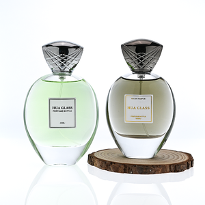 <span class=keywords><strong>Prix</strong></span> d'usine – Flacon de parfum vide transparent et arrondi de 30 ml, 50 ml, 75 ml, 100 ml, avec couvercle irrégulier en alliage de zinc Zamac de luxe et emballage cadeau - Product Image 1
