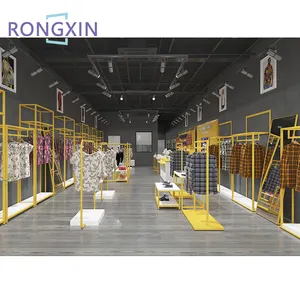 Estante de exhibición de ropa para centro comercial, mobiliario de diseño de tienda de venta al por menor, color dorado