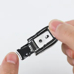 Venda quente de mini máquina de cortar unhas de dedo portátil com um coletor de plástico anti-respingos