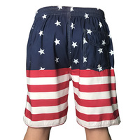 Design personnalisé d'usine OEM en polyester avec cordon de serrage pour hommes Impression numérique personnalisée Drapeau des États-Unis Maillot de bain d'été Boardshorts