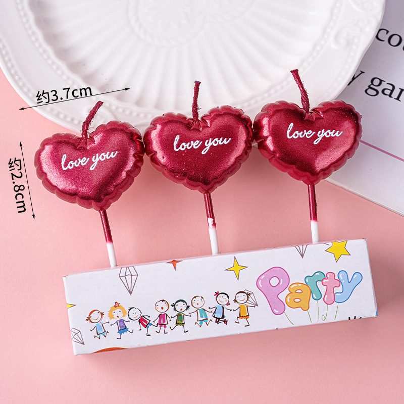 Bougies en forme de coeur couleur vin rouge