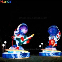 Modèle géant gonflable d'astronaute pour scène de carnaval, énorme astronaute gonflable couché sur la Lune, personnalisé avec éclairage