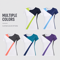 Haut de tennis personnalisé pour femme à manches courtes, color block, avec empiècements géométriques, idéal pour le sport, l'entraînement et les matchs sur le court