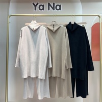 Nouvel ensemble décontracté tricoté pour femme : pull ample à col roulé et pantalon large – Commande en gros