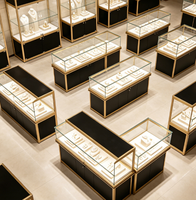 Vitrine de Luxe Personnalisée en Métal pour Bijoux avec Éclairage LED pour Centre Commercial - Présentoir en Verre Durable et de Haute Qualité