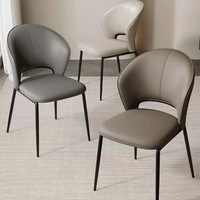 Ensemble de chaises de salle à manger d'appartement moderne d'usine avec revêtement en similicuir, pieds en métal, chaise simple sans accoudoirs de luxe pour meubles de maison