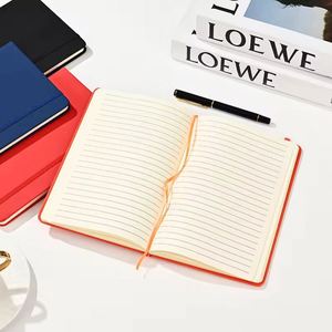 Cuaderno de tapa dura A5 con cubierta de PU, encuadernación cosida, páginas rayadas, colores naranja, rojo, azul y negro, para uso de oficina y estudiantes. - Product Image 1