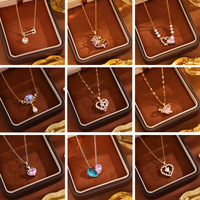 Colliers en acier inoxydable de styles variés en gros avec pendentifs haut de gamme, colliers délicats en or 18 carats pour femmes