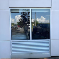 Fenêtre à persienne fixe pour hôtel au design moderne Cadre en alliage d'aluminium Porte anti-panique Devanture en fibre de verre à impact d'ouragan