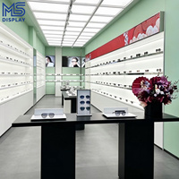 Conception d'intérieur personnalisée pour magasin d'optique, étagère d'exposition de lunettes avec mur arrière LED, mobilier de magasin d'optique, comptoir îlot pour lunettes