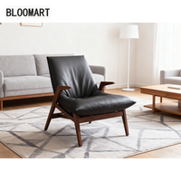Chaise de salon moderne en cuir, cadre en acier au carbone, remplissage éponge, bois ciré blanc, couleur noyer