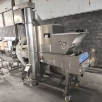 Commerciële machine voor het aanbrengen van paneermeel op kip, vis en garnalen met bloem en broodkruimels.