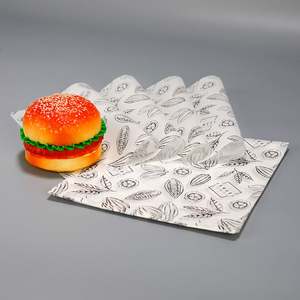 Papel de Envolver para Mantequilla Biodegradable y Resistente a la Grasa, Impreso Personalizado, de Grado Alimenticio, de 38-90g, para Empacar Sándwiches, Pizzas y Pan - Product Image 1