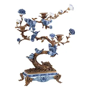 Interior home decor ceramic candlestick made of porcelain and bronze fittings inspired by a classic design parrot candle holder