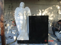 Stèles et monuments funéraires modernes en marbre blanc et noir, statues en granit personnalisées