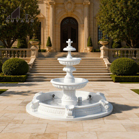 Maßgefertigter Klassischer 3-Stufiger Granit-Steinbrunnen mit Verzierter Relief-Schnitzerei für Villa, Hinterhof und Gartendekoration