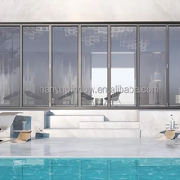 Porte pliante en verre en alliage d'aluminium moderne imperméable avec surface finie pour entrée de villa, balcon et patio