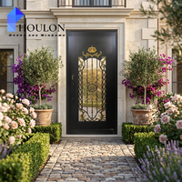 Porte d'entrée haut de gamme en noir mat avec accents dorés et inserts en verre transparent pour résidence haut de gamme