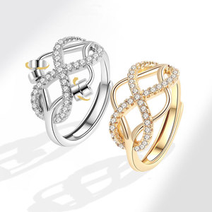 Anillo giratorio antiestrés con cuentas, circonitas pavé, cobre chapado en oro, ajustable, diseño infinito entrecruzado, joyería para aliviar el estrés para mujeres - Product Image 1