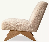 Fauteuil lounge sans accoudoirs en chêne massif, style simplicité moderne, avec cadre artisanal, rembourrage sur mesure, dossier incliné et pieds coniques en V inversé