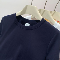 T-shirt basique en coton tricoté pour femme, nouveau pull d'été amincissant décontracté, haut à épaule droite, couleur unie simple, teint uni
