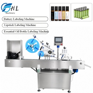 Machine d'étiquetage automatique HL-215 pour le dessus des petits flacons d'échantillons, des tubes de cigares et de cigarettes, des flacons et des bouteilles - Product Image 1