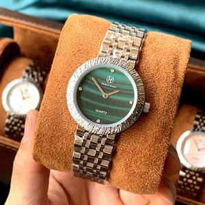 New women's wristwatch with high aesthetic quality mother-of-pearl <b>face</b> and steel band - Product Image 4