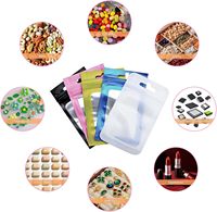 Sachets plats refermables noirs en aluminium avec fermeture éclair et fenêtre, personnalisables avec logo, pour cosmétiques et outils de maquillage