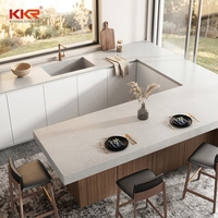 Comptoir de cuisine en pierre artificielle au design moderne, surface solide sans silicone pour usage domestique ou hôtelier