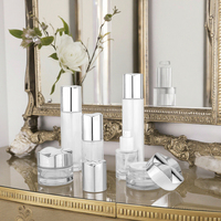 35ml 100ml 120ml ensemble de bouteilles en verre de luxe cylindriques vide 30g couvercle de pot poli sérigraphie pompe pulvérisateur emballage de crème pour le visage