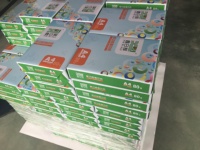 Équipement de production pour le découpage, le refendage, le superposition, l'emballage et le conditionnement en carton de rouleaux de papier copie A4 de qualité commerciale