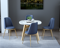Chaises de salle à manger modernes en tissu de velours bleu Table 6 places à structure en métal doré Fabriqué en Chine Dragon Mart Dubai avec cuir PU