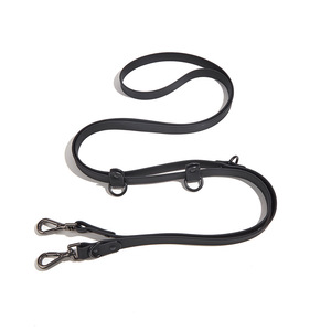 Guinzaglio per Cani a Mani Libere in PVC da 2,5m, Guinzaglio Elastico Regolabile da Cintura per Corsa e Passeggiate Notturne, Impermeabile Riflettente, Doppio Guinzaglio per Cani - Product Image 1