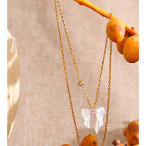 Collar JINYOU 3527 de Acero Inoxidable Chapado en Oro con Forma de Lazo y Concha Blanca con Circonita Cúbica Redonda - Product Image 3