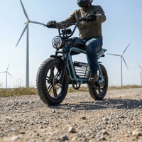 Vélo électrique tout-terrain robuste pour adultes avec fourche à suspension avant, idéal pour les chemins d'accès aux éoliennes