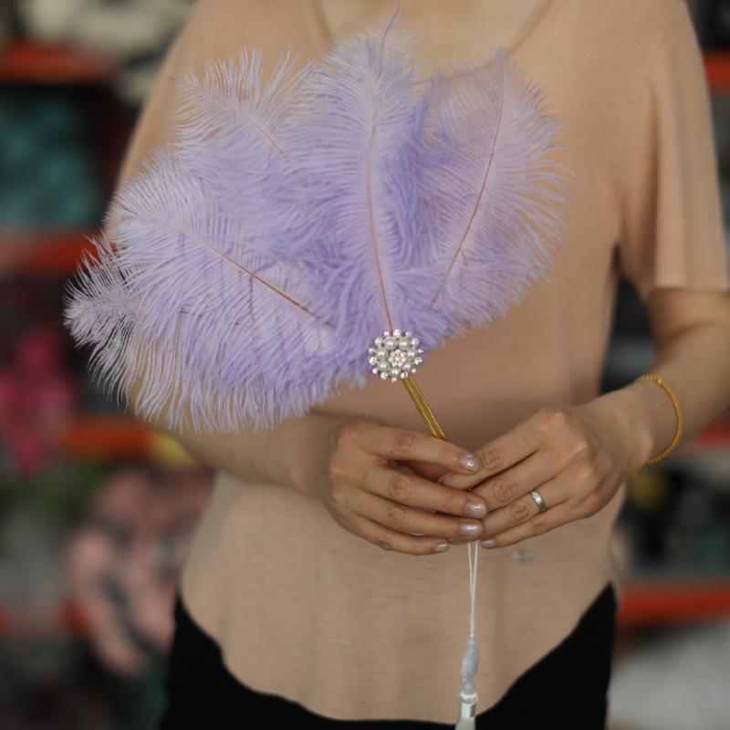 Perle à manche doré violet clair