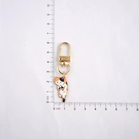 Porte-clés en métal mignon en forme de chat, pendentif léger et décoratif pour sac et étui d'écouteurs
