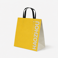 Sac en papier kraft robuste et écologique avec poignée, personnalisable avec logo, idéal pour l'emballage cadeau - Prix direct usine