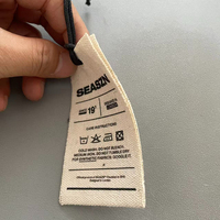 Étiquette personnalisée en toile de coton naturel épaisse avec logo et nom, à faible MOQ, avec cordon et œillet métallique, pour vêtements