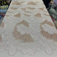 Vente en gros de tissu en dentelle brodée Sniny avec paillettes 2025 plus récent tissu en dentelle de perles africaines pour femmes robes de soirée de mariage