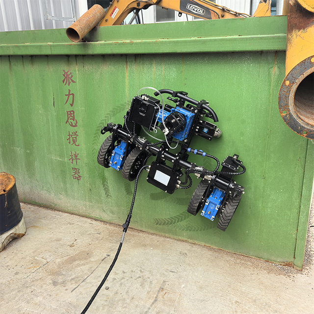 Wall Climbing Robot for Dust Cleaning Purpose in a High Risk Building's