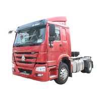 Truk Traktor Sinotruk HOWO 4X2 Kabin Atap Tinggi Merah Tugas Berat Penarik Utama Semi Trailer Head WD615.47 351-450HP Euro 2