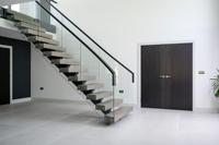 Escalier central en acier moderne Prima avec design personnalisé pour les projets de construction résidentielle