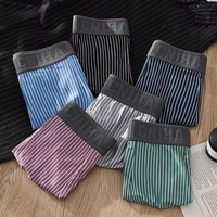 Caleçons boxers rayés sans couture pour hommes, taille mi-haute, très élastiques, confortables et respirants, shorts pour jeunes, vente en gros