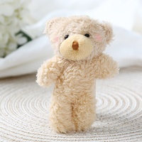 Ours en peluche à grosse tête, peluche courte et coton PP, emballage en sac en filet, accessoires de bouquet, pendentif
